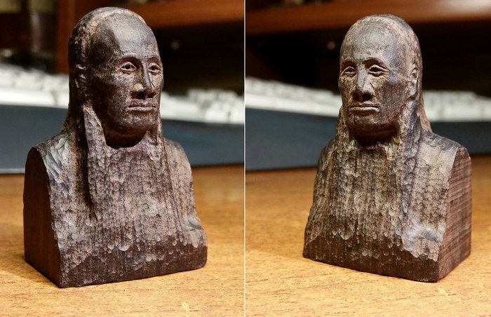 Резьба человеческого лица из древесины африканского черного дерева